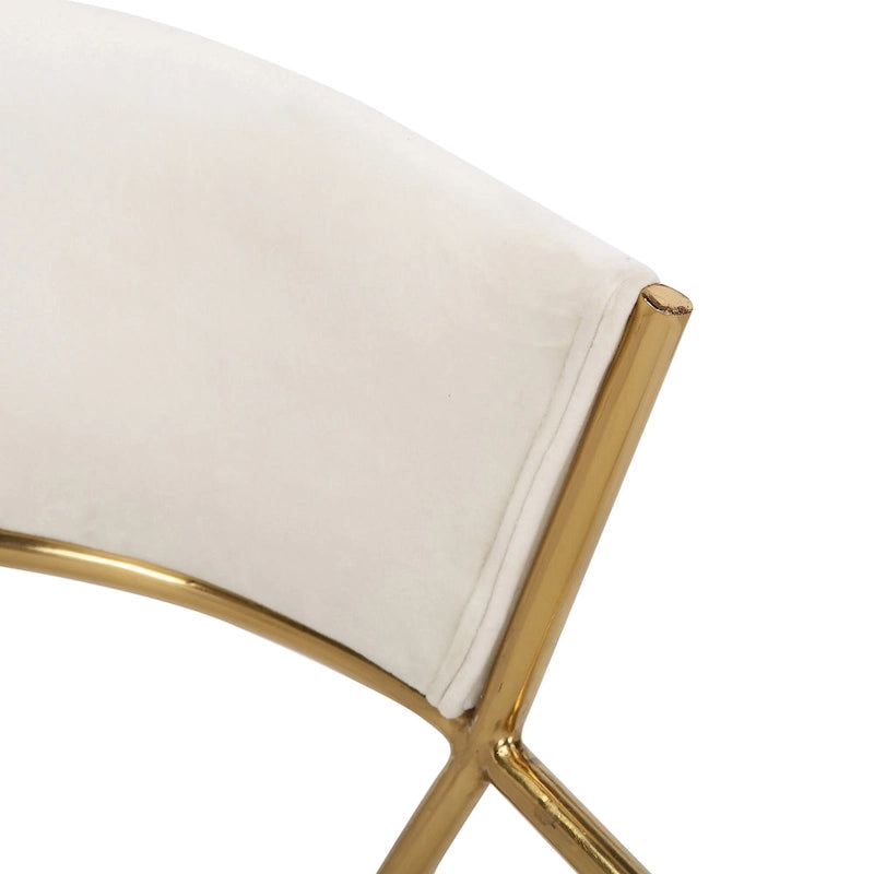 Chaise de salle à manger tapissée dorée