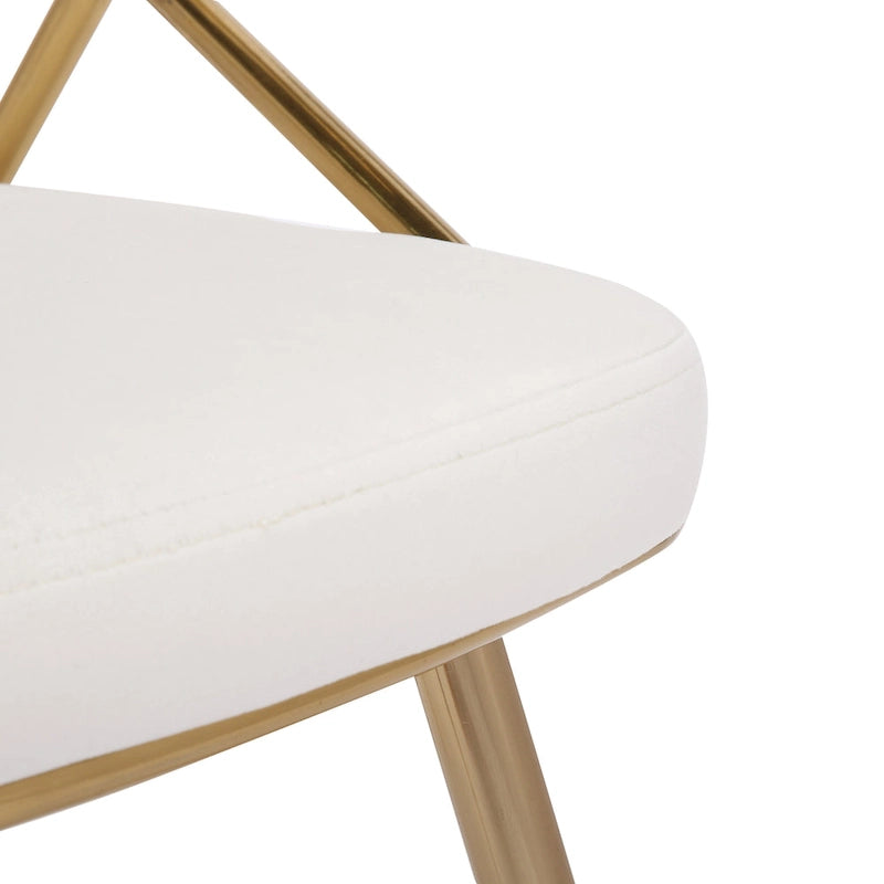Chaise de salle à manger tapissée dorée